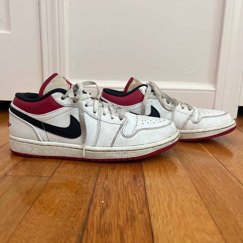 Nike Air Jordan Low White with Red and Black accents- 7Y (fits Women’s 8)